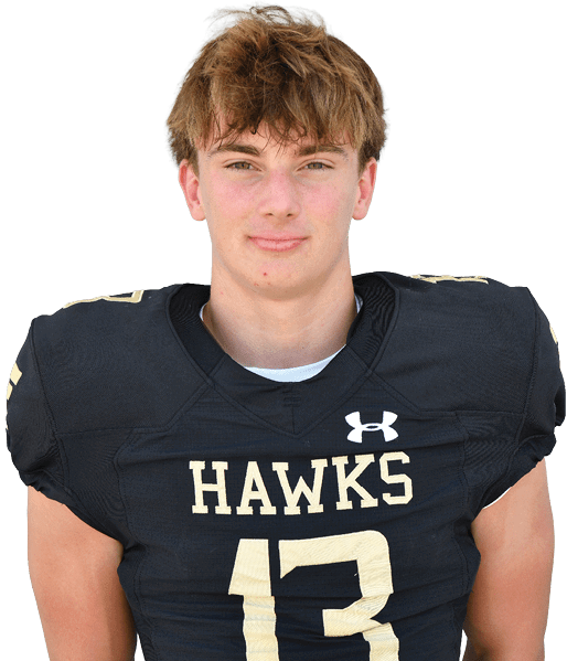 A person with short light brown hair wearing a black football jersey with the word “HAWKS" and the number 82 on the front. Description generated by AI