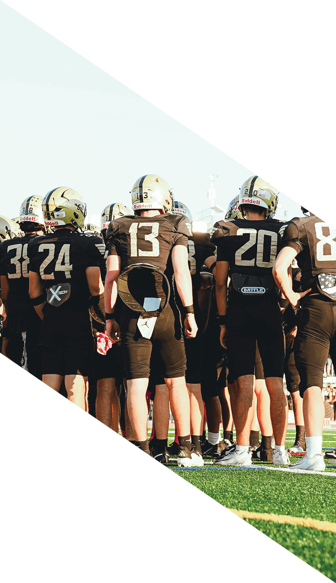 A football team is gathered around a coach, listening to his instructions. AI generated content
