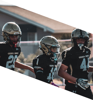 A group of football players wearing headphones and smiling. AI generated content