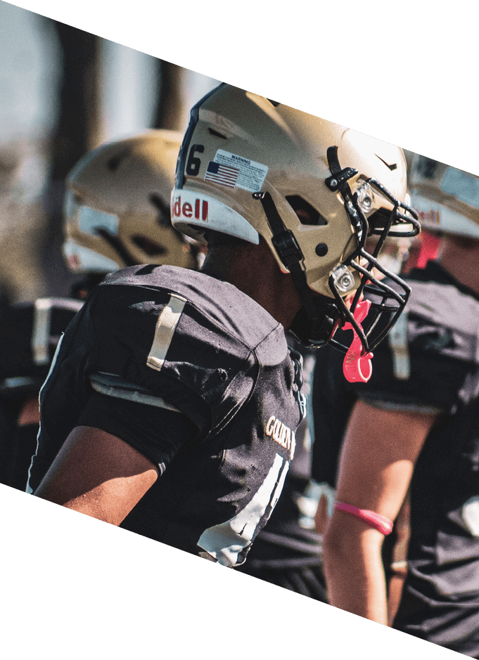 A group of people wearing black jerseys are huddled together on a field. AI generated content
