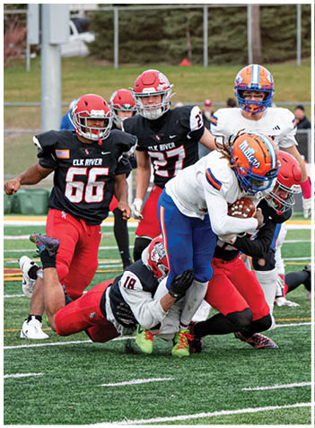 A football player wearing a blue jersey with the number 58 on it. Description generated by AI