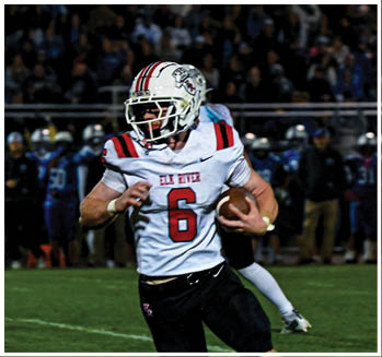 A group of football players celebrating a touchdown. Description generated by AI
