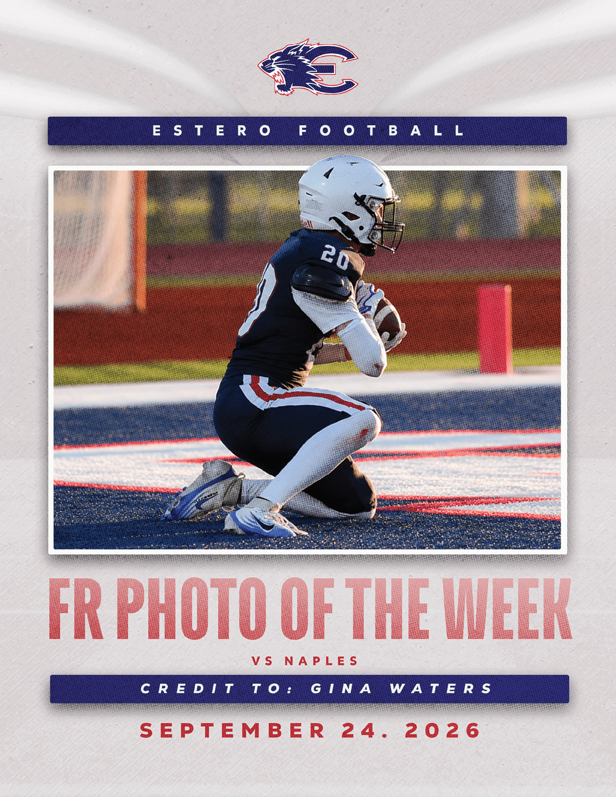 Two football players in white uniforms with helmets embrace on the field during a game. Description generated by AI