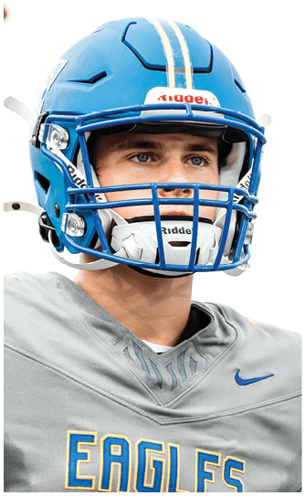 A football player catching a ball. Description generated by AI