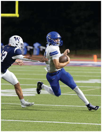 A football player wearing a blue jersey with the number 58 on it. Description generated by AI