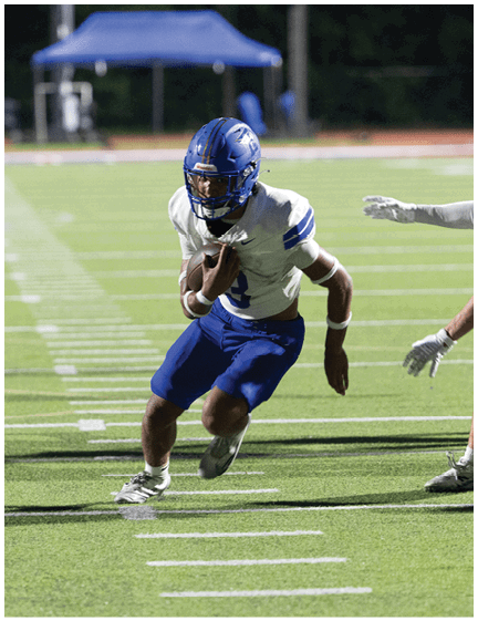 A football player wearing a blue jersey with the number 58 on it. Description generated by AI