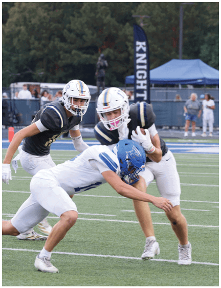 A football player wearing a blue jersey with the number 58 on it. Description generated by AI