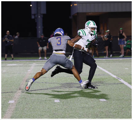 A football player running on the field. Description generated by AI