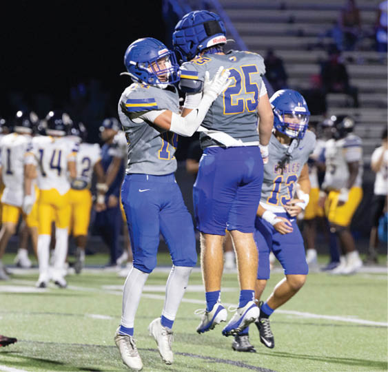 A group of football players celebrating a victory. AI generated content