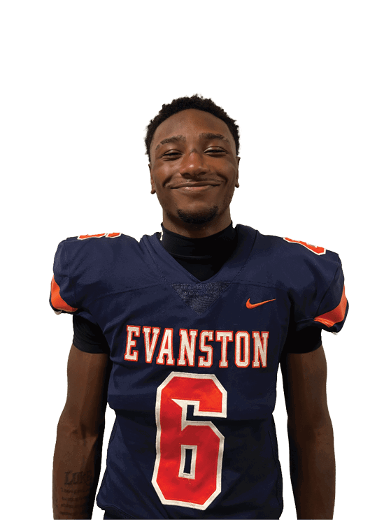 A person wearing a navy blue football jersey with orange and white lettering that says “EVANSTON" and the number 6 is smiling. Description generated by AI