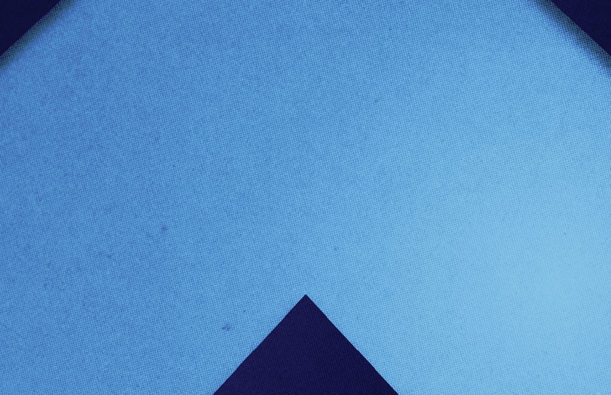 A blue and red triangular shape. Description generated by AI