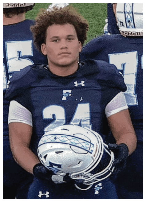 Two football players wearing black jerseys and holding hands. Description generated by AI