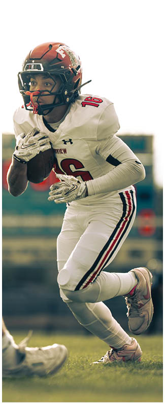 A football player wearing a blue jersey with the number 58 on it. Description generated by AI