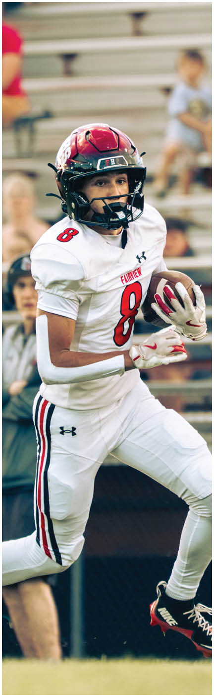 A football player wearing a blue jersey with the number 58 on it. Description generated by AI