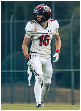 A football player wearing a blue jersey with the number 58 on it. Description generated by AI