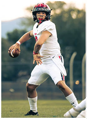 A football player wearing a blue jersey with the number 58 on it. Description generated by AI