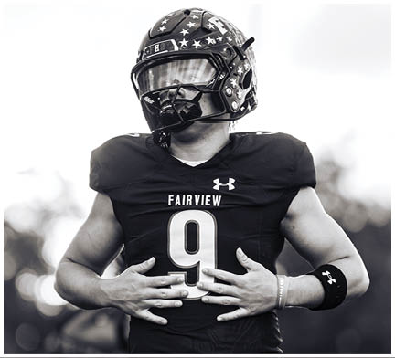 A football player running on the field. Description generated by AI