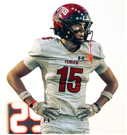 A football player running on the field. Description generated by AI