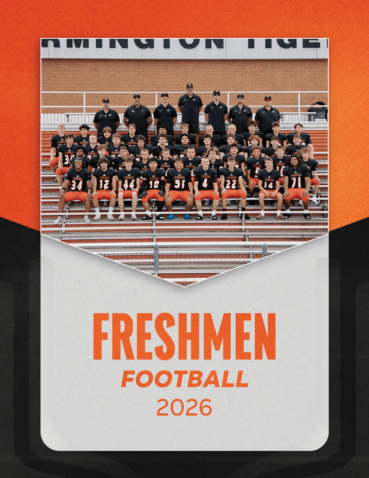 A group of football players sitting on a bench. Description generated by AI