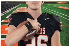 A young man wearing a white jersey with the number 10 on it. Description generated by AI