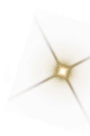 A gold circle with a white center. Description generated by AI