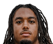 Person with long dreadlocks wearing a maroon football jersey with the number 10 and the word Seminoles on the front. Description generated by AI
