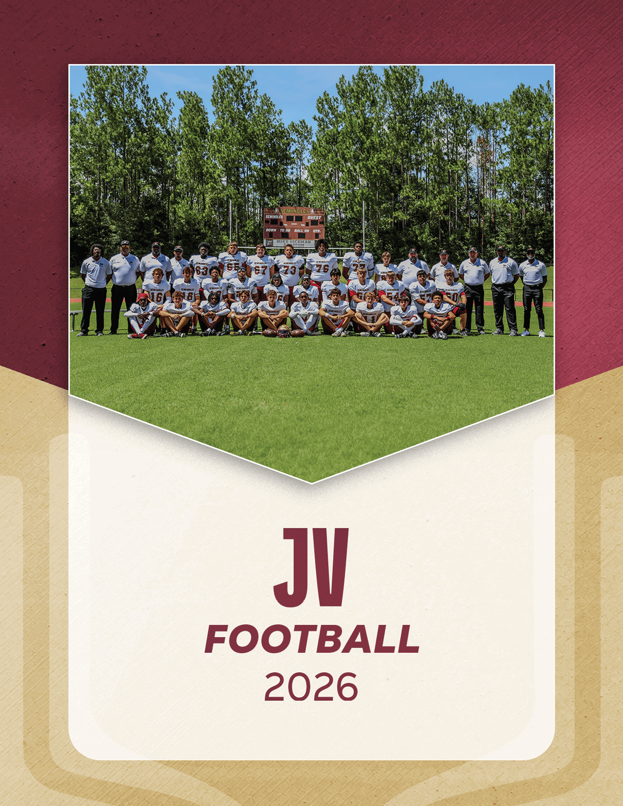A group of people in football uniforms and coaches standing and kneeling on a grassy field with trees and a scoreboard in the background, labeled JV Football 2026. Description generated by AI