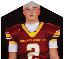A young man wearing a white jersey with the number 10 on it. Description generated by AI