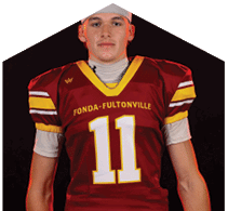 A young man wearing a white jersey with the number 10 on it. Description generated by AI