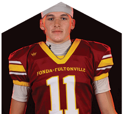 A young man wearing a white jersey with the number 10 on it. Description generated by AI