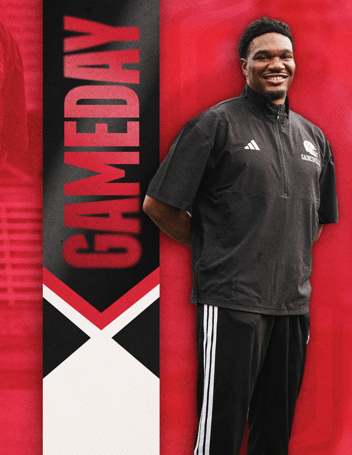 A person wearing a black Adidas sports outfit stands smiling against a red background with the word GAMEDAY in bold red letters on a black vertical banner. Description generated by AI