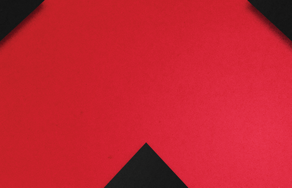 A red and black triangle. Description generated by AI