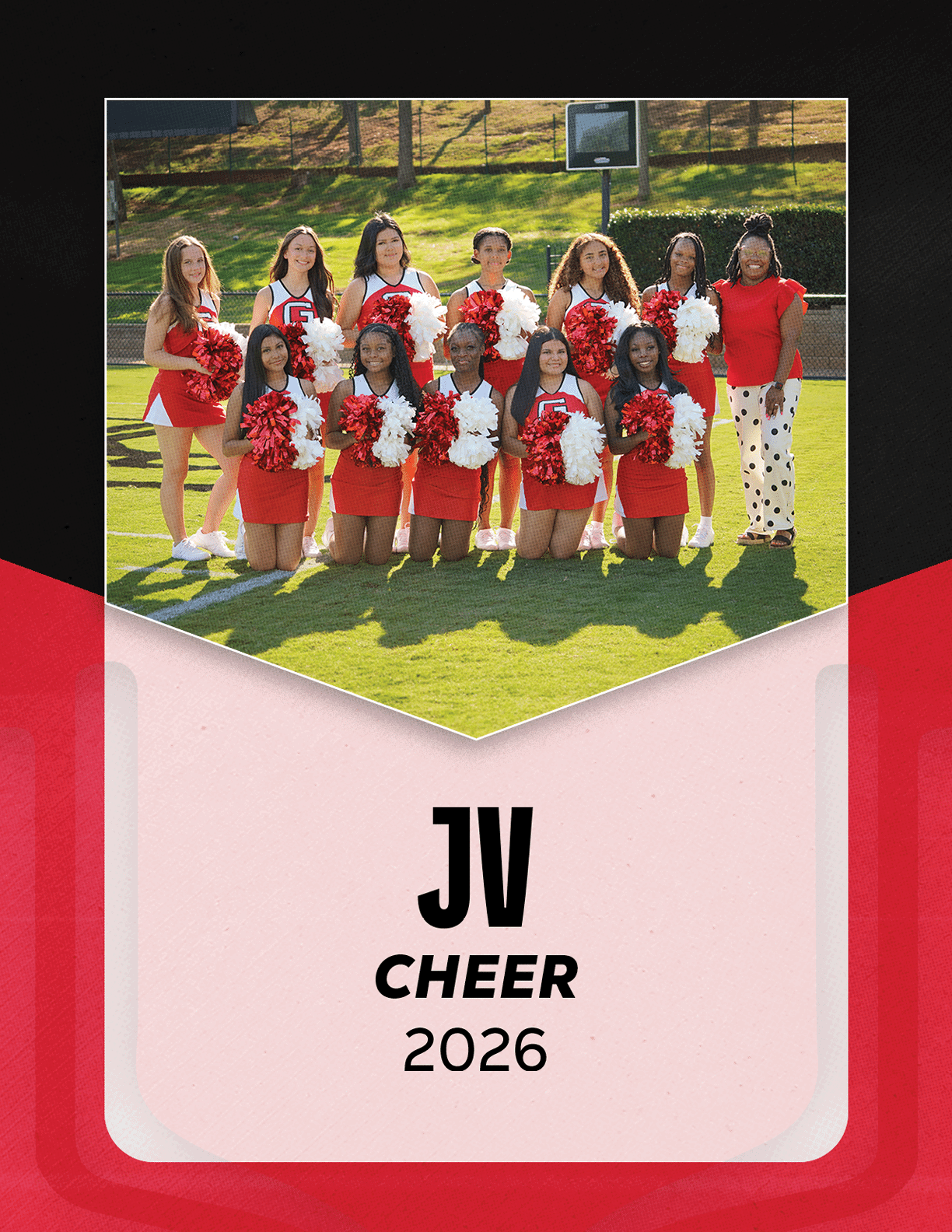 A group of people in red cheerleading uniforms holding red and white pom-poms pose on a grassy field with a basketball hoop in the background and text below reading JV Cheer 2026. Description generated by AI