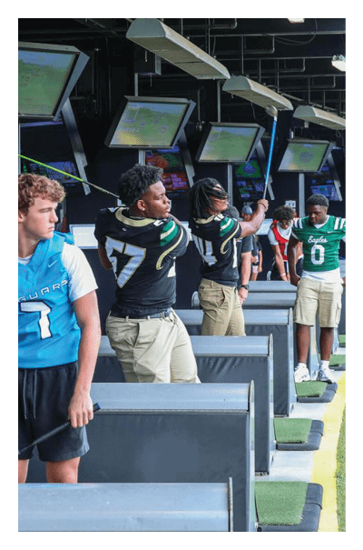 A young man wearing a football jersey with the name Vista on the back. AI generated content