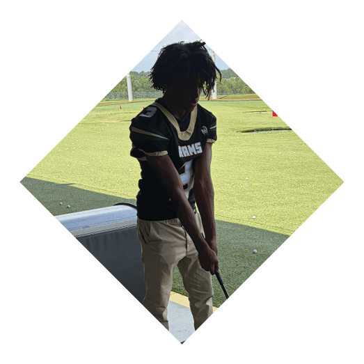 A female football player is kicking a football on a field. AI generated content