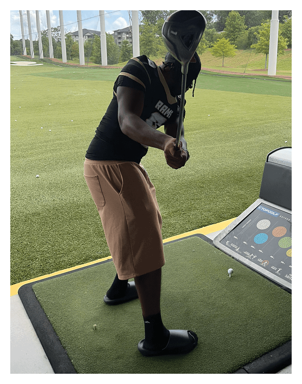 A football player wearing a helmet and white uniform is holding his helmet above his head. AI generated content