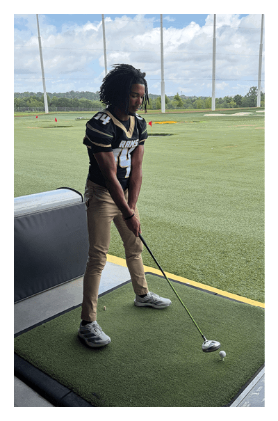 A young man wearing a football jersey with the name Vista on the back. AI generated content
