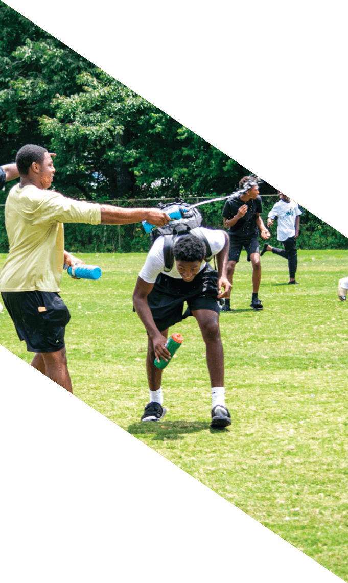 Three men wearing football uniforms are posing for a picture. AI generated content