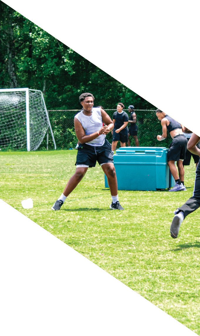 Three men wearing football uniforms are posing for a picture. AI generated content