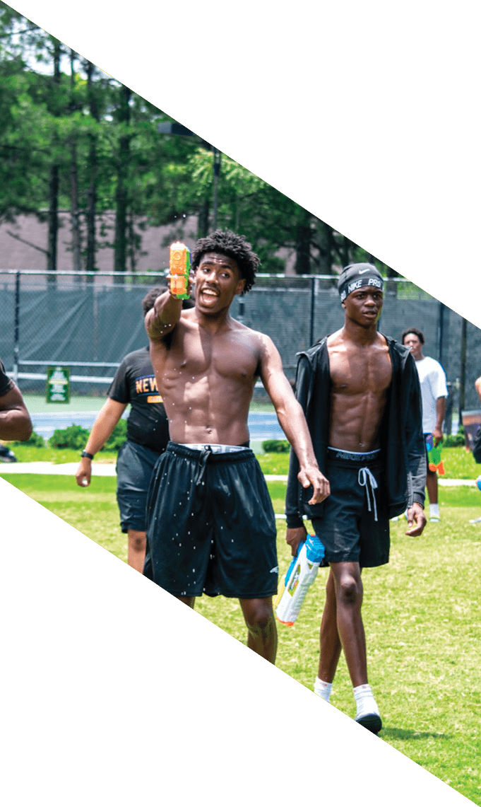 A group of football players pose for a picture. AI generated content