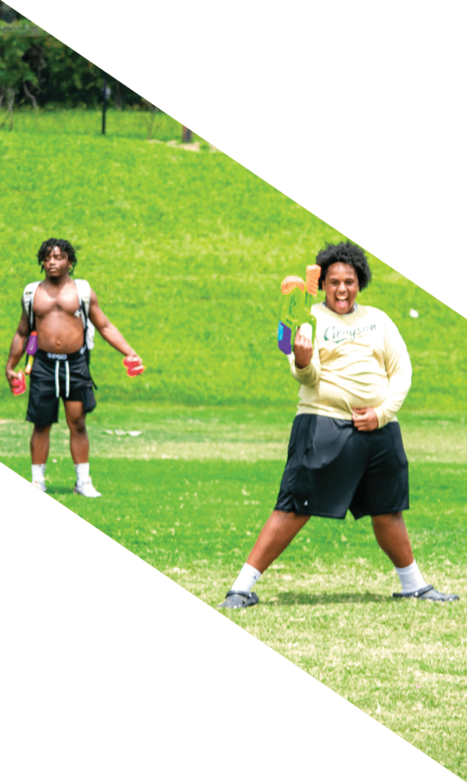 Three men wearing football uniforms are posing for a picture. AI generated content