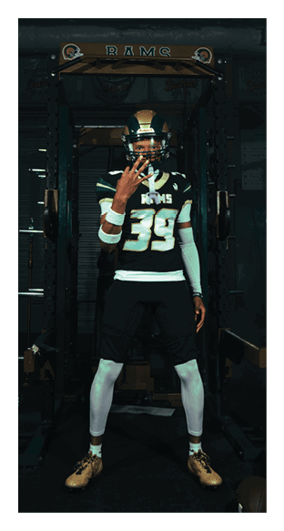 A football player is kneeling on the field, wearing a green jersey and a helmet. AI generated content