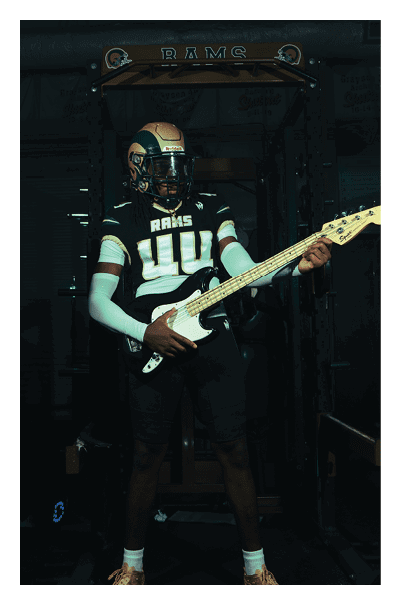 A young man wearing a football jersey with the name Vista on the back. AI generated content