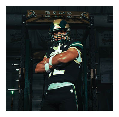 Two men wearing football helmets are talking to each other. AI generated content