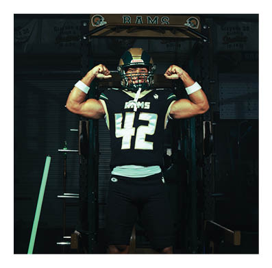 A football player in a white jersey with the number 85 on it is trying to catch a football. AI generated content