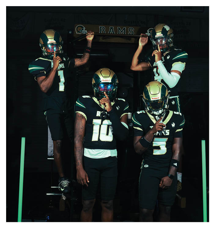 A group of football players walking on the field. AI generated content