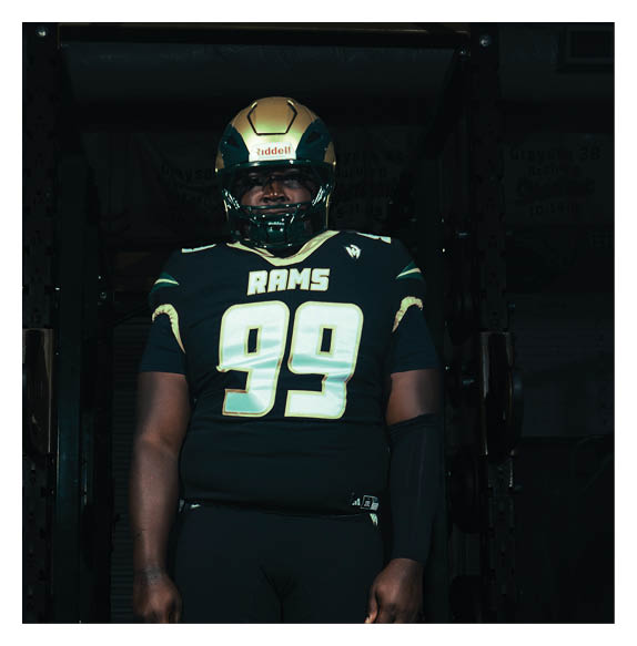 Two football players wearing Vista jerseys and holding hands. AI generated content
