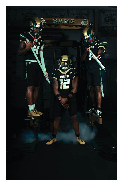 A football player wearing a black and white uniform with the number 10 on the back. AI generated content