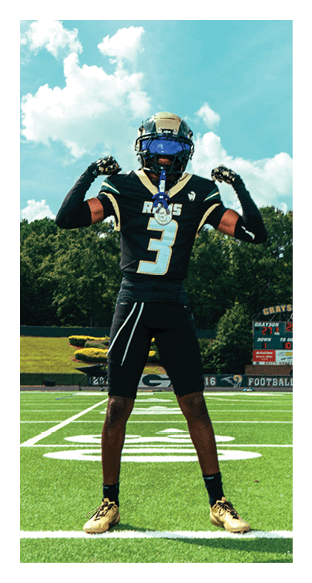 A football player is kneeling on the field, wearing a green jersey and a helmet. AI generated content