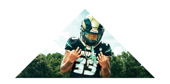 A football player wearing a black jersey with the number 16 on it is holding a football. AI generated content